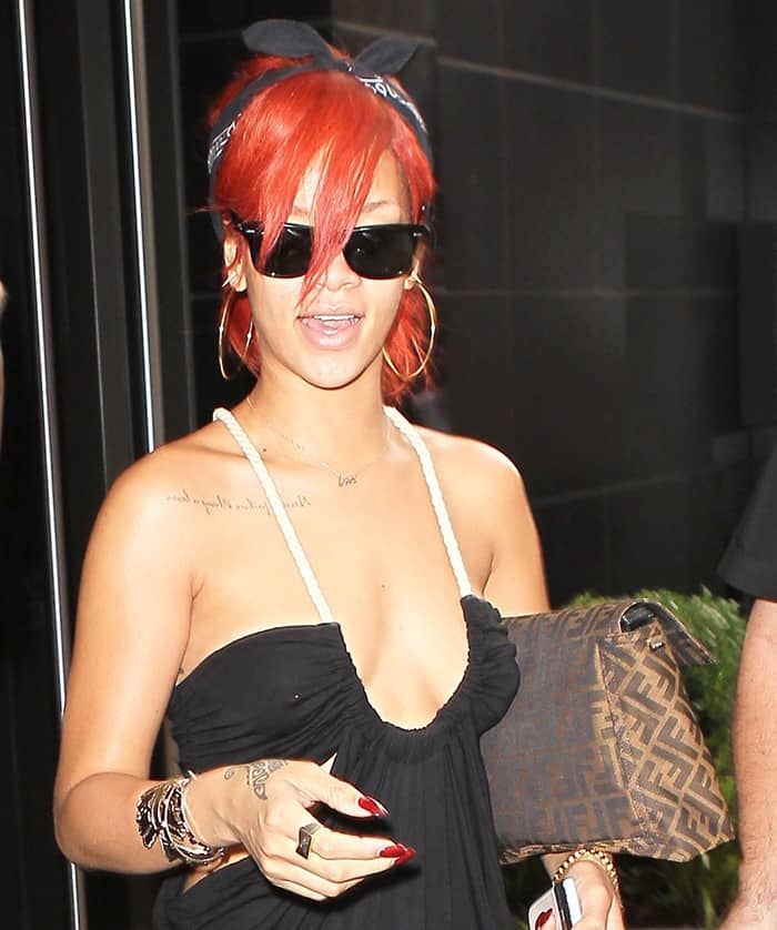 Rihanna wearing a House of Harlow bracelet while leaving her hotel in New York City on July 21, 2011