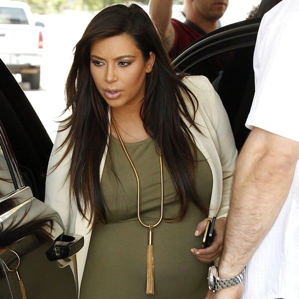 Kim Kardashian wears Saint Laurent 'Opium' tassel necklace