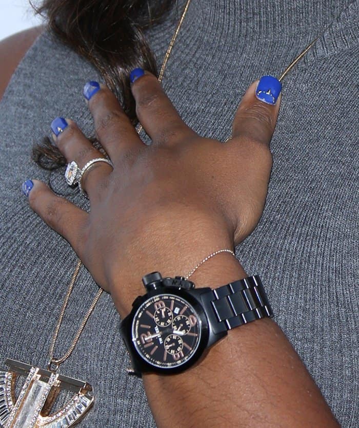 Kelly Rowland shows off a black-toned TW Steel watch from her own collection