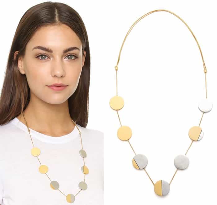 Seven asymmetrical discs hang from this fine, semi-layered Madewell chain necklace