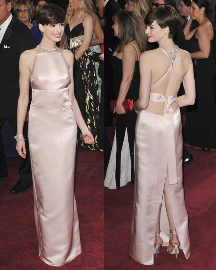 Anne Hathaway in a pink Prada column gown at the 85th Annual Oscars