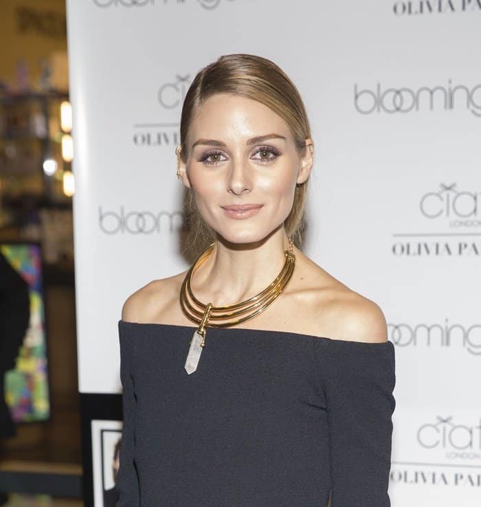 Olivia Palermo styled her Tibi top with a gold Baublebar statement quartz collar necklace