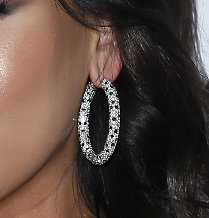 Dorothy Wang's diamond hoop earrings feature a mix of black and clear diamonds