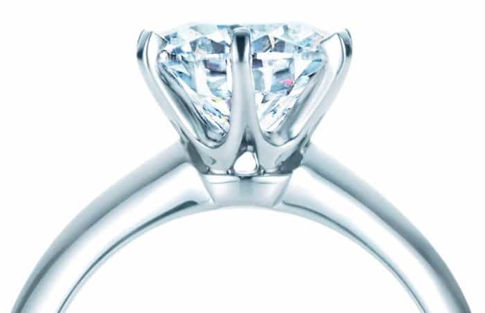 The facets of a real diamond will refract the light in different directions, rather than in a straight line