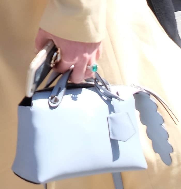 Lindsay Lohan shows off her emerald engagement ring and Fendi by the Way bag