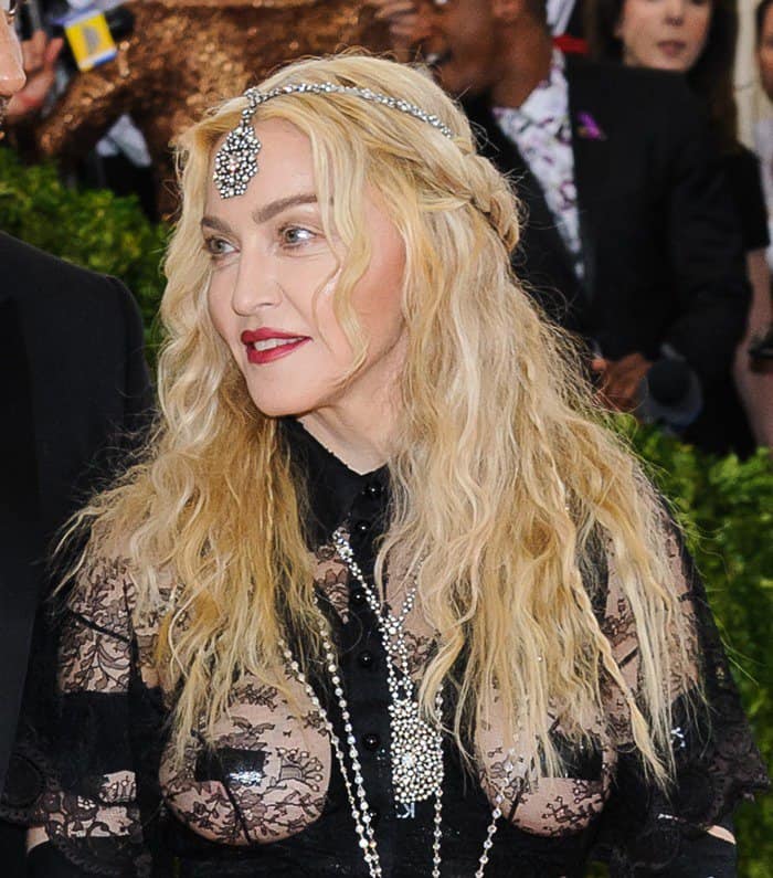Madonna rocked Riccardo Tisci for Givenchy, Lynn Ban rings, and a pendant by Neil Lane