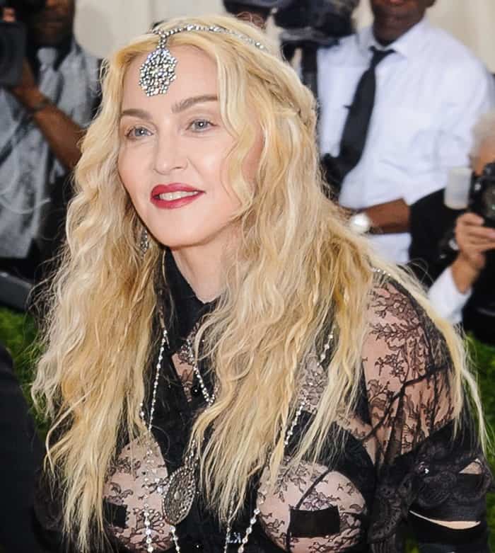 Madonna wears jewelry by celebrity designer Neil Lane