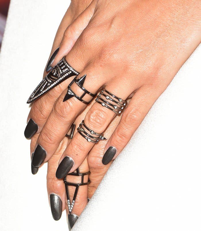 Nicole Scherzinger shows off her black manicure and matching rings from jewelry designer Lynn Ban