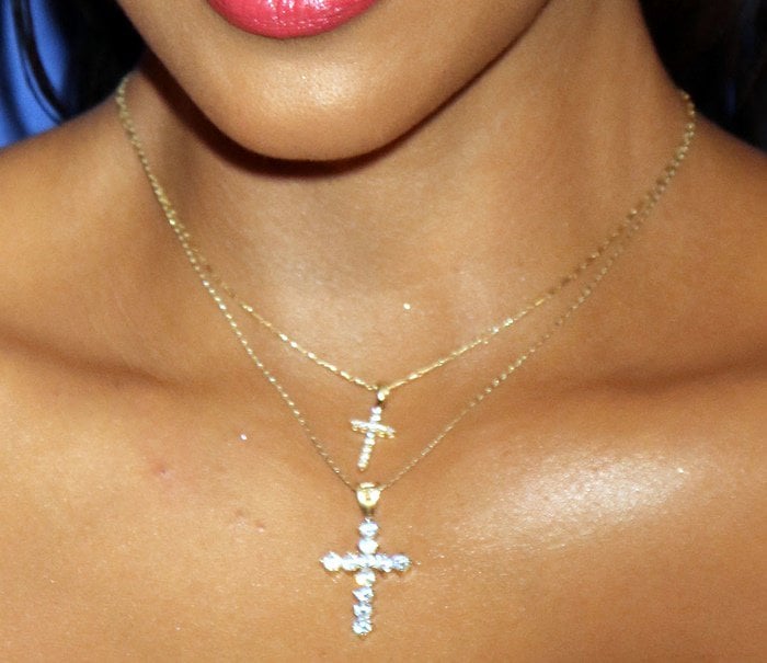 Kim Kardashian showing off her cross necklaces