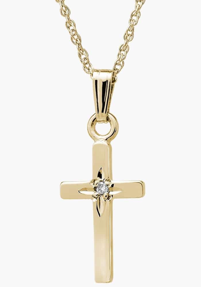 An intricate cross necklace crafted from 14-karat gold and centered with a sparkling diamond is sure to be a piece she'll wear for years to come