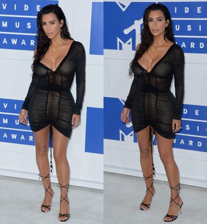 Kim Kardashian flaunted her legs in a sheer black dress