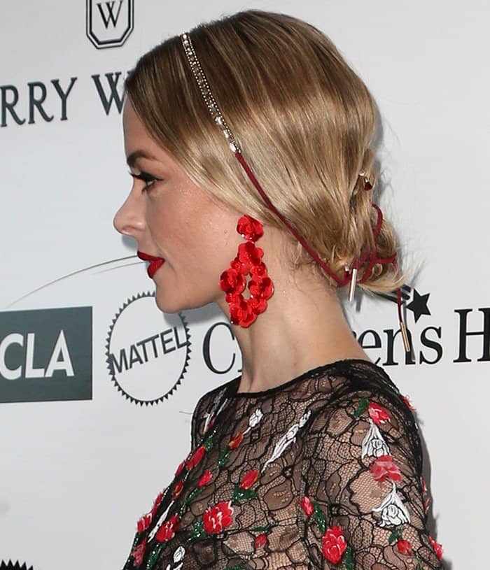Fierce red dangling earrings to punctuate the bold look