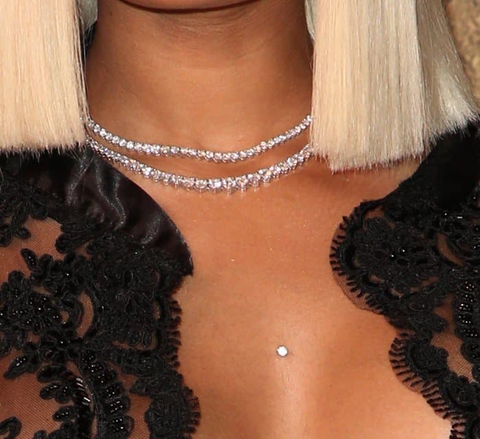Blac Chyna embellished her revealing look with gorgeous diamond jewelry.