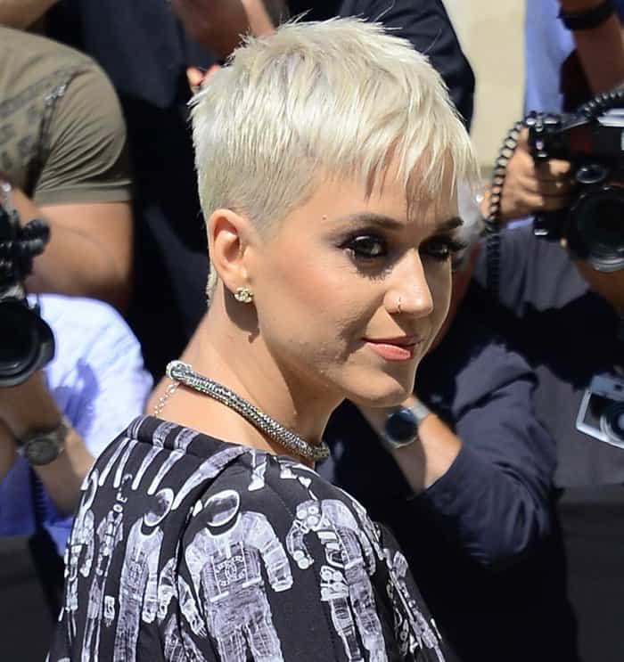 Katy Perry wearing Chanel jewelry at the Chanel Haute Couture Presentation.