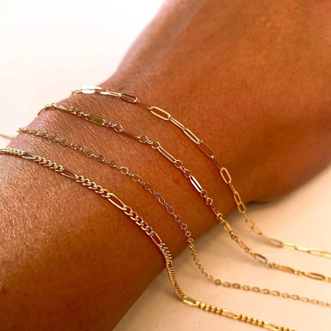 Permanent jewelry is often made from thin, delicate chains